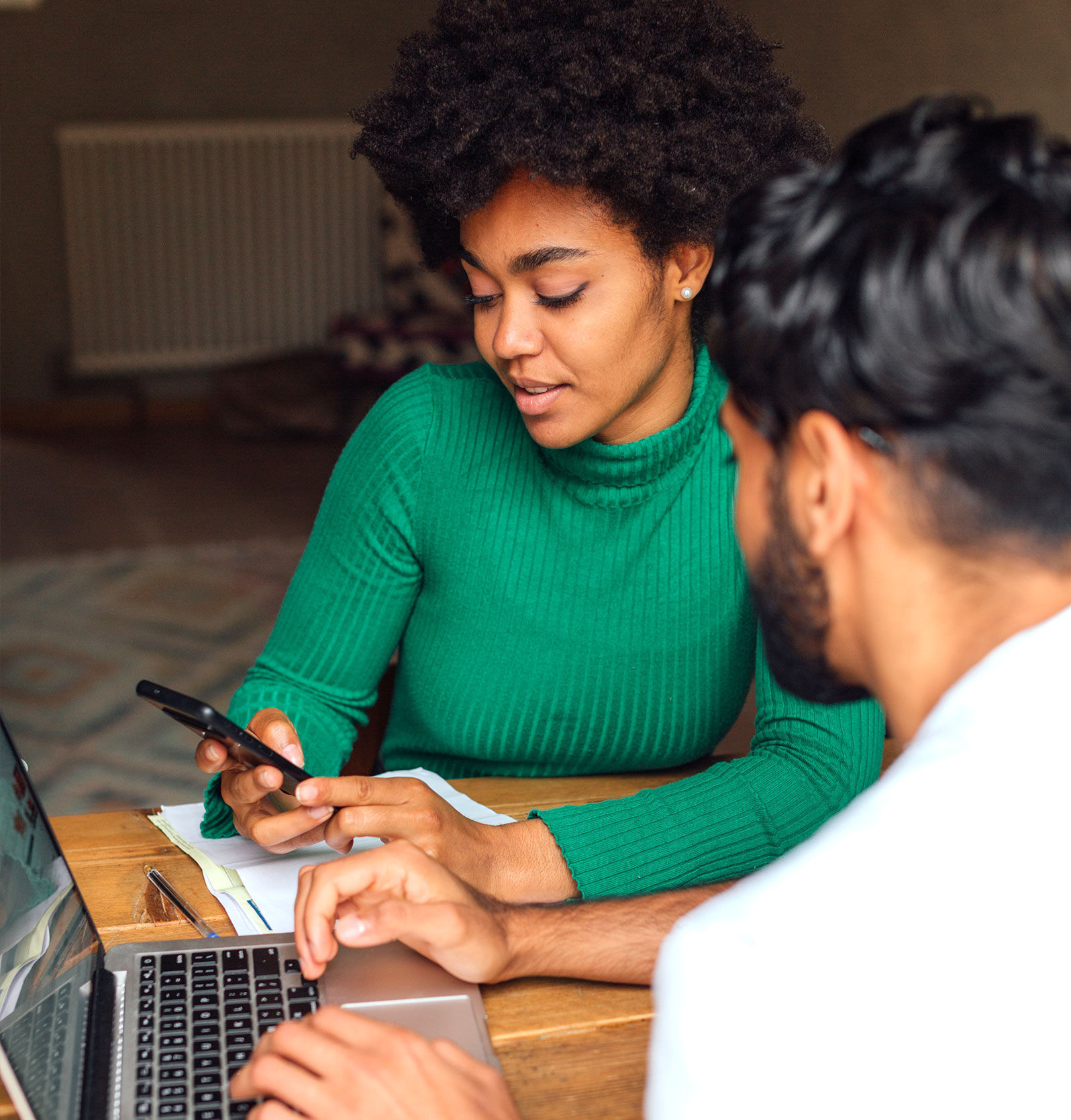 Couple Busy on Laptop